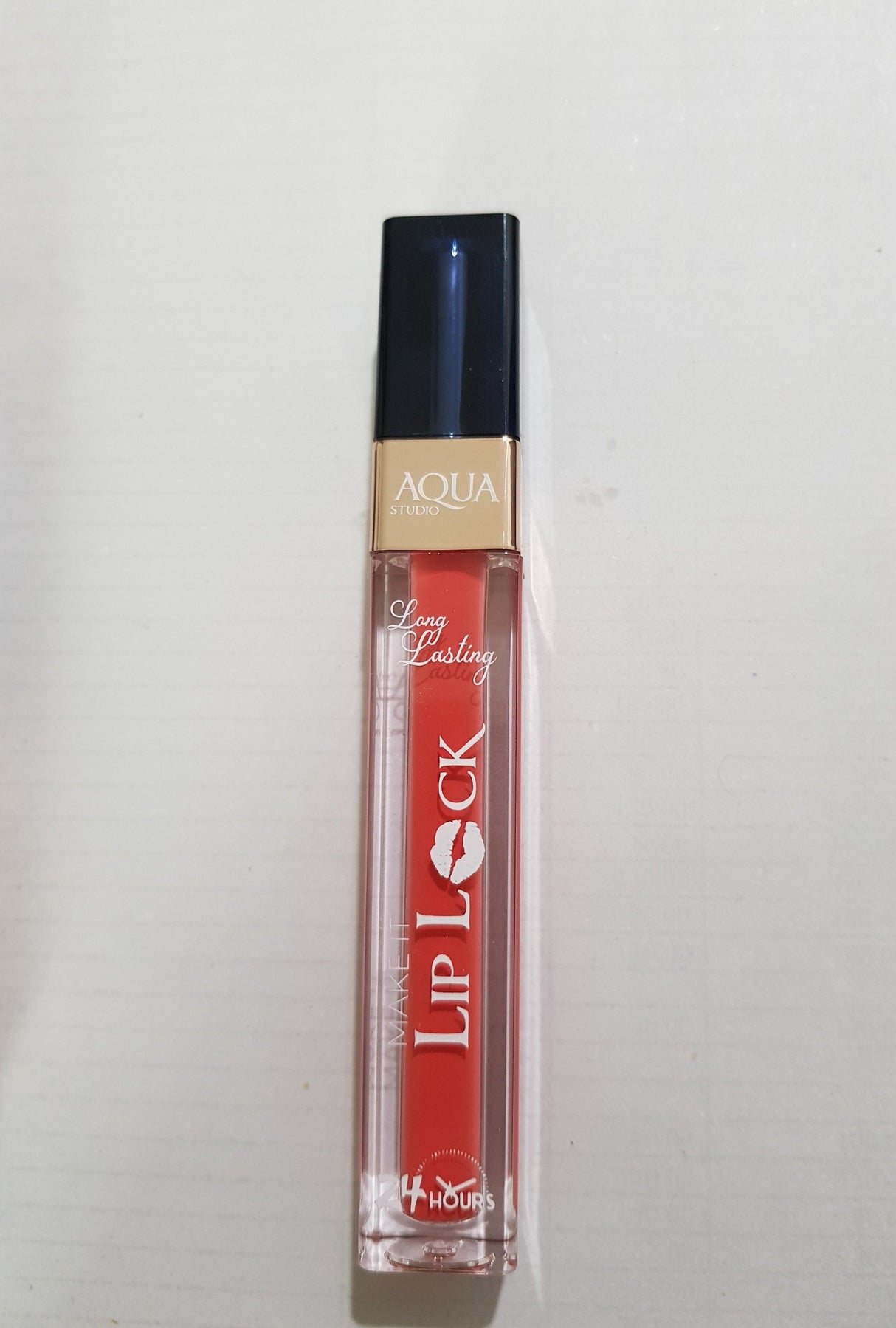 ORANGE PLUM MAKE IT LIP LOCK AQUA STUDIO LIP GLOSS