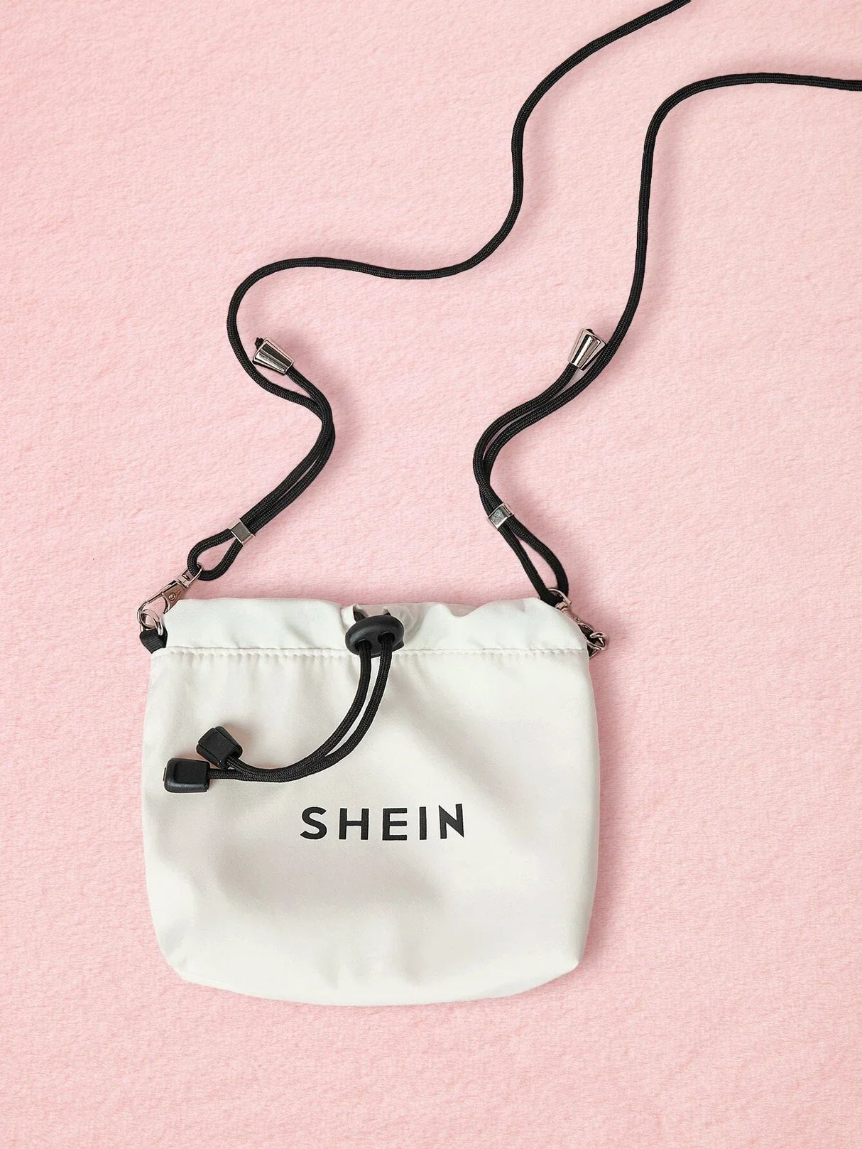 Buy Shein Letter Graphic Drawstring Crossbody Bag in Pakistan