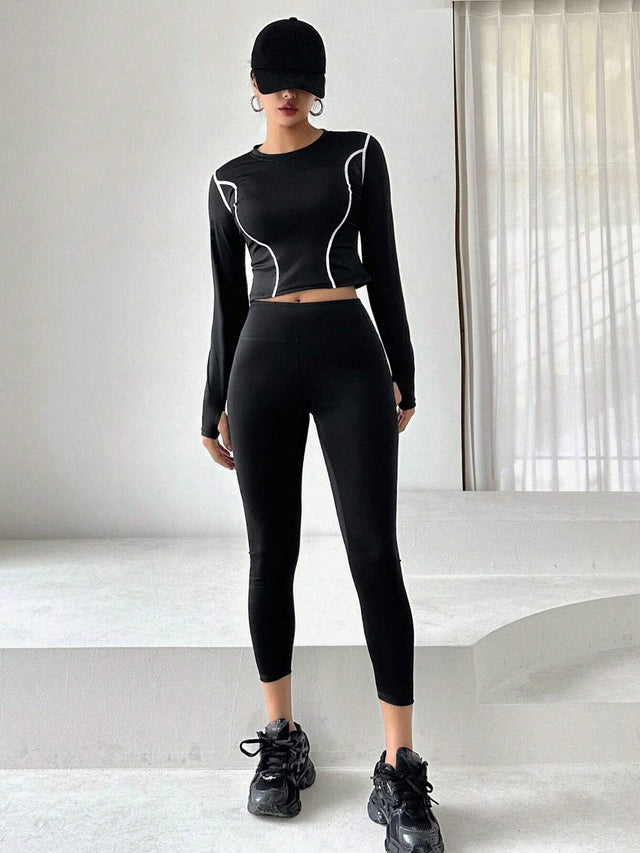 Buy SHEIN DAZY Women'S Color Block Rolled Edge Top With Solid Color Leggings Two Piece Set in Pakistan