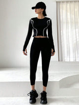 Buy SHEIN DAZY Women'S Color Block Rolled Edge Top With Solid Color Leggings Two Piece Set in Pakistan