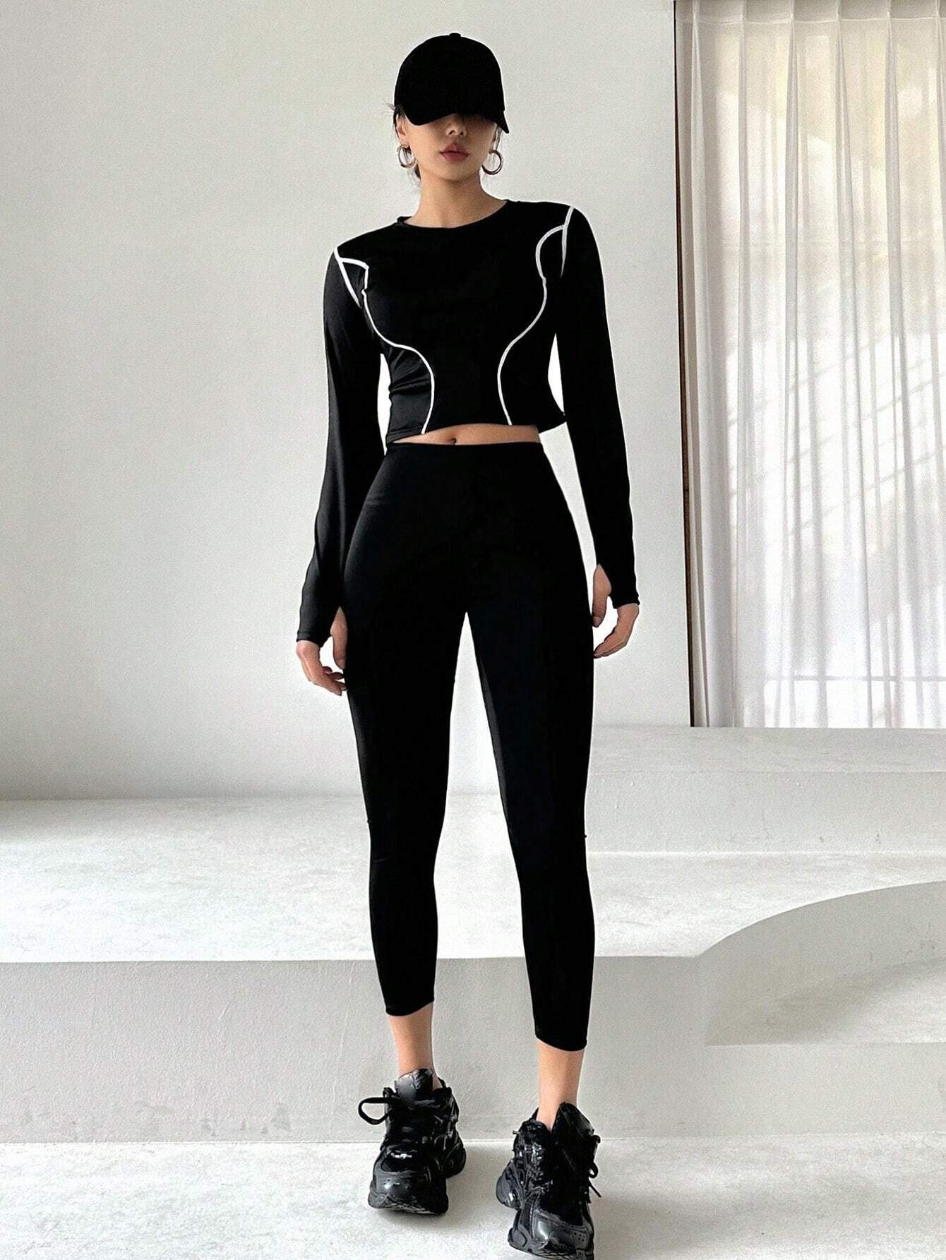 Buy SHEIN DAZY Women'S Color Block Rolled Edge Top With Solid Color Leggings Two Piece Set in Pakistan