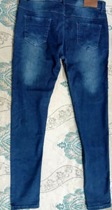 Stretchable Blue Jeans with Floral Pattern on Pockets