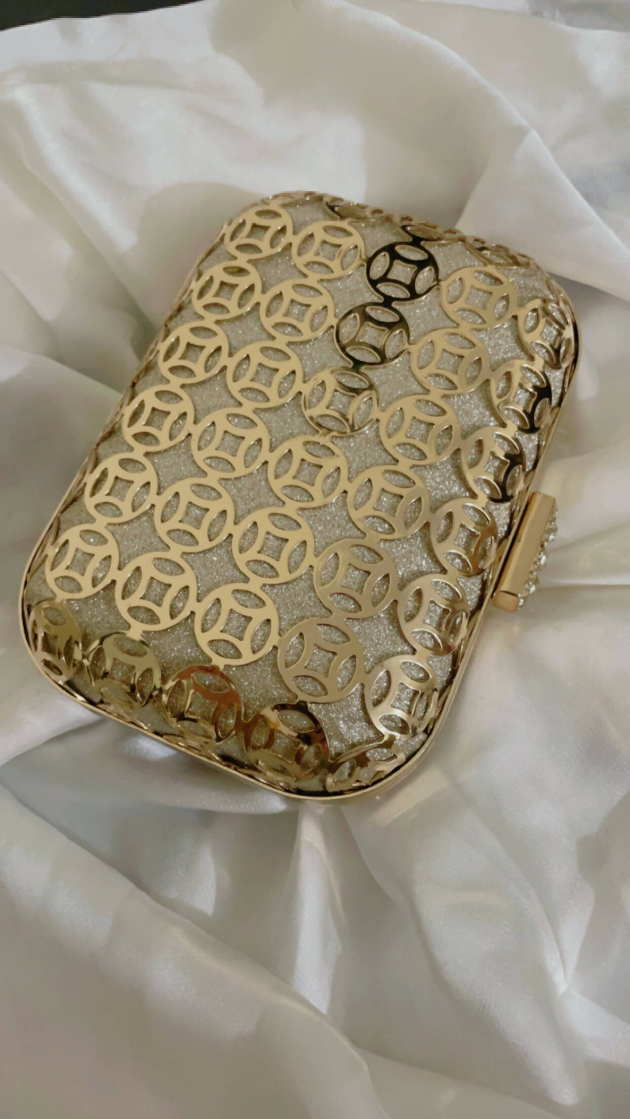 Gold and hotsell silver clutch bag