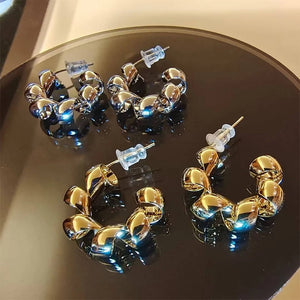 Golden hoop earrings | Earrings | Jewelry | New